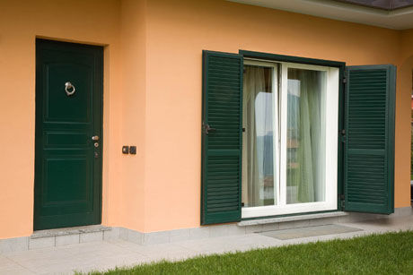 Puerta de entrada - STRONG - GINKO - abatible / de acero / blindada