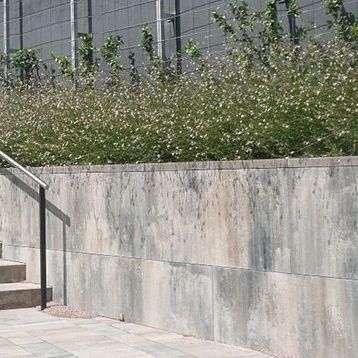 Revestimiento mural de hormigón - LLOSA VULCANO® - Breinco - de exterior / contemporáneo / texturizado