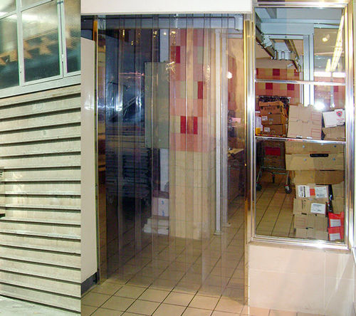 Puerta industrial flexible de lamas - KOPRON - de PVC / con aislamiento térmico / para hangar