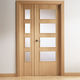 puerta de interior / de madera / abatible / acristalados