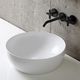 lavabo sobre mueble / de cerámica / acabado / redondo