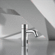 grifo monomando para lavabo / de repisa / electrónico / de metal cromado