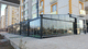 pérgola adosada / de metal / con cobertura corredera / para el sector profesional