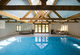 piscina de interior / enterrada / de piedra / en mosaico