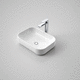 lavabo sobre mueble / de cerámica / rectangular / con 1 orificio