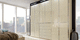 armario esquinero / contemporáneo / de madera / con puertas corredizas