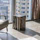taburete contemporáneo / de madera / de madera fosilizada / con base central