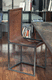 silla contemporánea / de interior / de piel de vaca / con base de acero