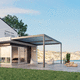 pérgola adosada / de aluminio / con láminas móviles