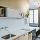 cocina contemporánea / de madera / lacada / para residencia de estudiantes