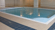piscina de interior / enterrada / de acero inoxidable / con baldosas