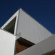 revestimiento de fachada en láminas / de aluminio / vertical / lacado