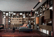 biblioteca suelo-techo / esquinera / contemporánea / de roble