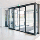 puerta de interior / de aluminio anodizado / corredera / contemporánea