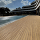 tarima de exterior de madera / de PVC / con clip / ranurada