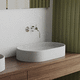 lavabo sobre mueble / de hormigón / acabado mate / ovalado