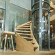 escalera helicoidal / con peldaños de madera / con estructura de madera / contemporánea