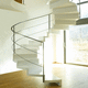 escalera helicoidal / con peldaños de metal / con estructura de metal / para uso residencial
