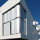 contraventana corredera / plegable / de metal / aspecto madera