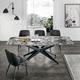 mesa de comedor contemporánea / de vidrio / de arenisca / con base metálica