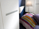 armario contemporáneo / de madera / con puertas batientes / puente para cama