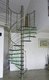escalera de caracol / helicoidal / con peldaños de vidrio / con estructura de acero inoxidable