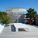 banco para jardín contemporáneo / de acero pintado / de aluminio extruido / sin respaldo