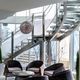 escalera de caracol / con peldaños de hormigón / con estructura de acero inoxidable / contemporánea