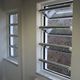 ventana de aluminio / de lamas / con vidrio triple / de corte térmico