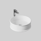 lavabo sobre mueble / de cerámica / brillante / acabado mate