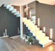 escalera en L / con peldaños de madera / para uso residencial / de interior