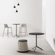 mesa contemporánea / de madera / con base metálica / redonda