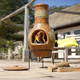 chimenea de leña / de suelo / Cara única / de jardín