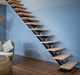escalera en L / con peldaños de madera / con peldaños de vidrio / con estructura de acero lacado