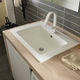 lavabo encastrable / de cerámica / con grifo mezclador / rectangular