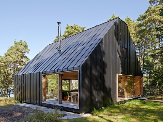 CASA HUSARÖ POR THAM Y VIDEGÅRD ARKITEKTER