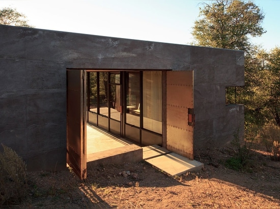 Fuera de la red en Arizona: Caldera de la casa de los arquitectos del POLVO