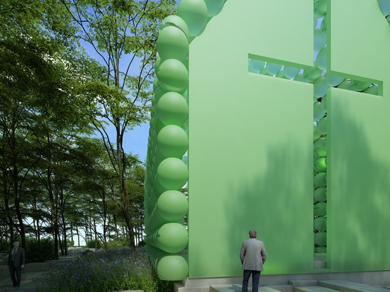 la ciudad y la capilla verde del hormigón en el bosque se hace de esferas