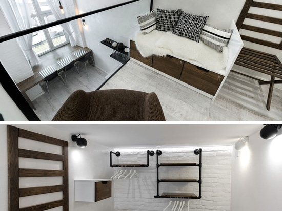 Este apartamento distintamente blanco y negro con un nivel del entresuelo es casero para los pares jovenes