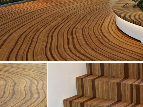 Este piso de madera diseñado a medida fue hecho para parecerse a los anillos de crecimiento de un árbol