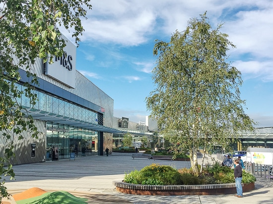 Islas ovales del árbol para el centro comercial de Glasgow