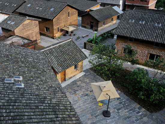 Los socios de Ares transforman los cortijos chinos viejos para crear el centro turístico de montaña de la casa del YUN